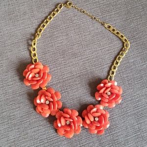 Red flower statement necklace.